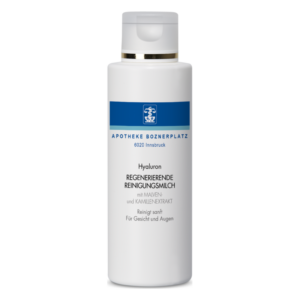 Weiße Flasche mit abgerundetem Deckel, beschriftet mit regenerierender Reinigungsmilch für Gesicht und Augen, Hyaluron und Pflanzenextrakten.