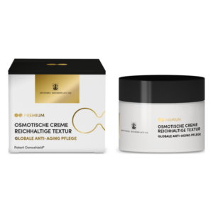 Osmotische Creme mit reichhaltiger Textur in einem weißen Tiegel und schwarzer Verpackung für globale Anti-Aging Pflege.