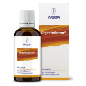 Braune Flasche mit weißem Deckel und gelblicher Verpackung, enthält Digestionmittel von Weleda.