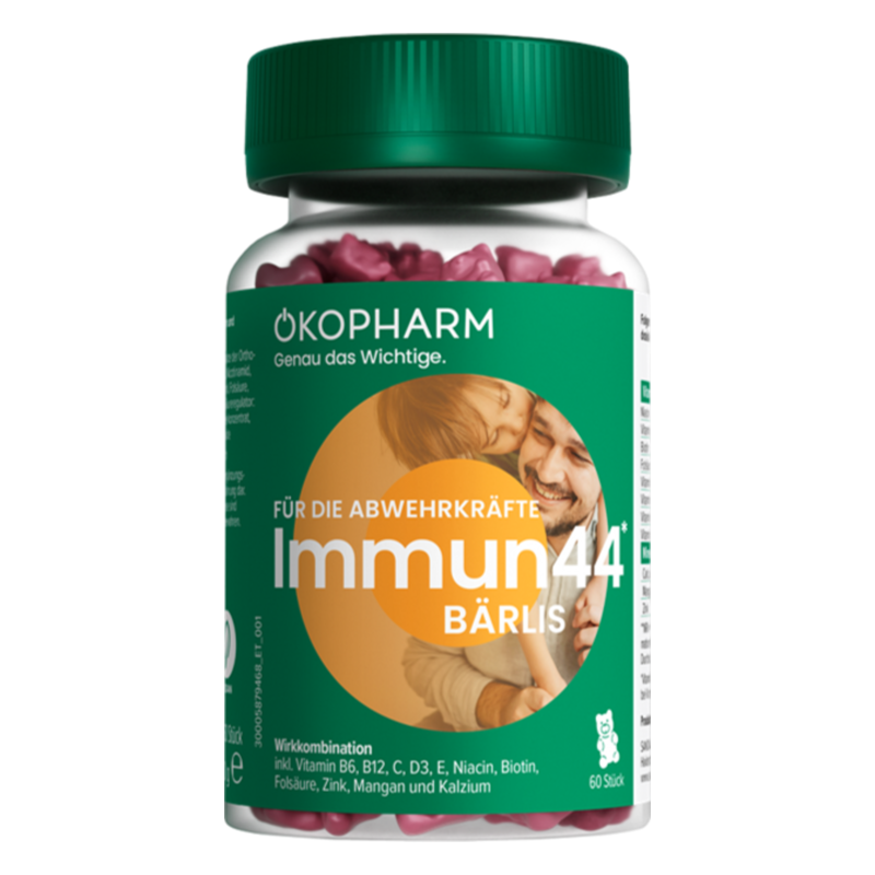 Packung mit Nahrungsergänzungsmitteln zur Unterstützung des Immunsystems, mit einem grünen Deckel und rosa Kapseln.