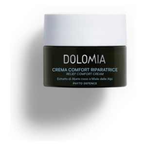 Schwarzer Cremetopf mit weißem Deckel, beschriftet mit "DOLIMIA CREMA COMFORT RIPARATRICE" und Inhaltsstoffen.