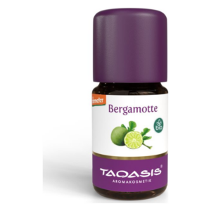 Braune Glasflasche mit lila Kappe, etikettiert mit 'Bergamotte' und Bio-Symbol, vom Hersteller Taqasis.