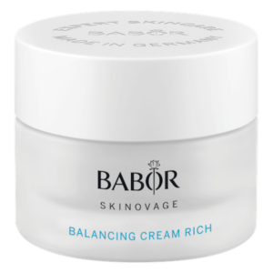Eine weiße Cremedose mit einem hellen Deckel und der Aufschrift 'BALANCING CREAM RICH' von BABOR.