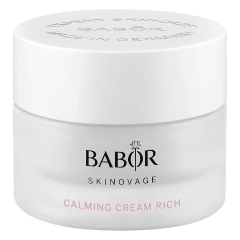 Weißes Tiegel-Design mit einem zweifarbigen Deckel, beschriftet mit "BABOR SKINOVAGE CALMING CREAM RICH".