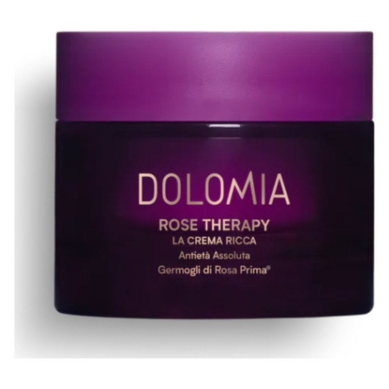 Dunkelviolette Creme mit goldener Schrift, verpackt in einem runden Glasbehälter mit Schraubverschluss.