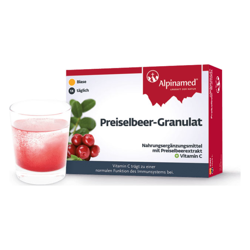 Verpackung von Preiselbeer-Granulat neben einem Glas mit rotem Getränk, enthält Vitamin C zur Immununterstützung.