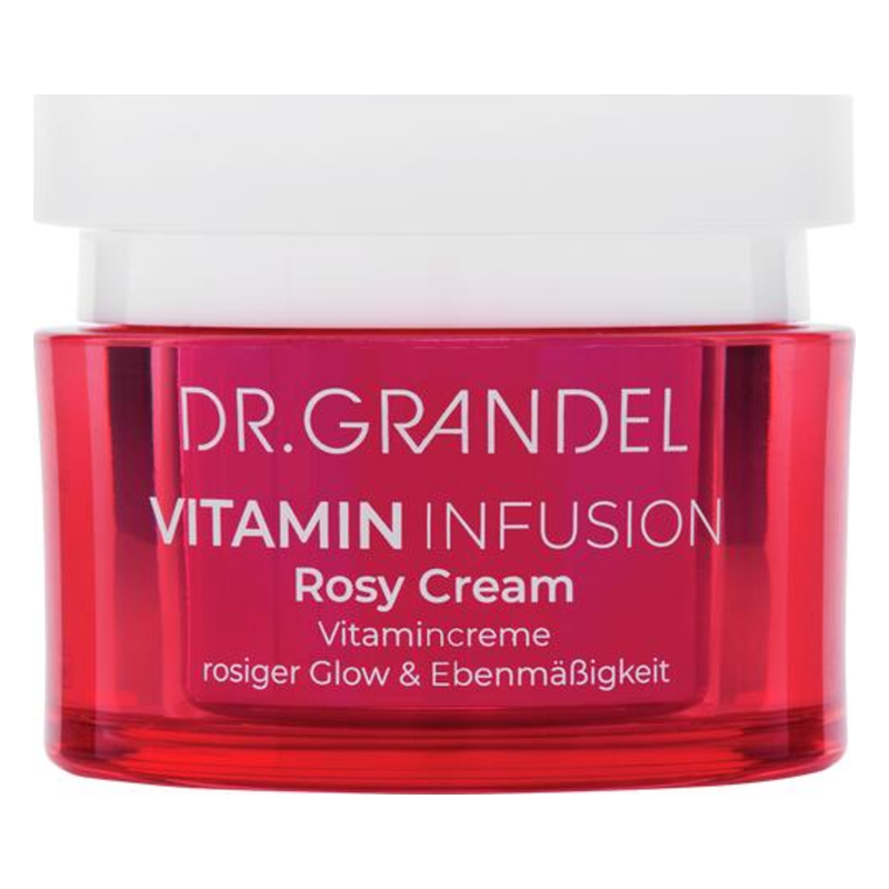 Rote Tagescreme in einem transparenten Tiegel mit einem weißen Deckel, beschriftet mit "Vitamin Infusion Rosy Cream".
