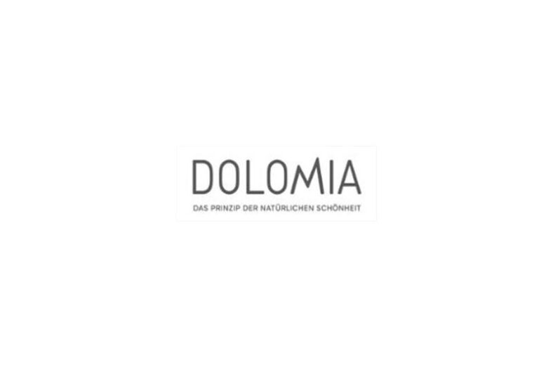 Logo von Dolomia mit dem Slogan "Das Prinzip der natürlichen Schönheit" in einem klaren, minimalistischen Design.