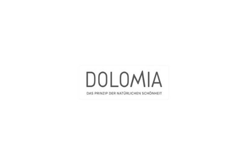 Logo von Dolomia mit dem Slogan "Das Prinzip der natürlichen Schönheit" in einem klaren, minimalistischen Design.