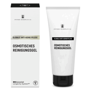 Weißes Reinigungsgel in einer Tube neben einer Verpackung mit dem Aufdruck "Globale Anti-Aging Pflege".