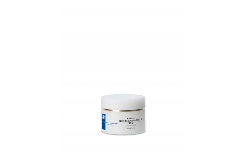 HyaluronFeuchtigkeitsspendendeCreme.jpg Weißes Cremetöpfchen mit einem solchen Deckel und Aufschrift: "Hyaluron Feuchtigkeits spendende Creme mit Vitamin E".